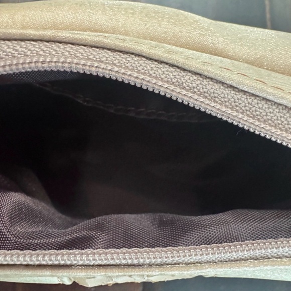 MCM Mini Top Handle Bag
Champagne Monogram Leather - Picture 13 of 15